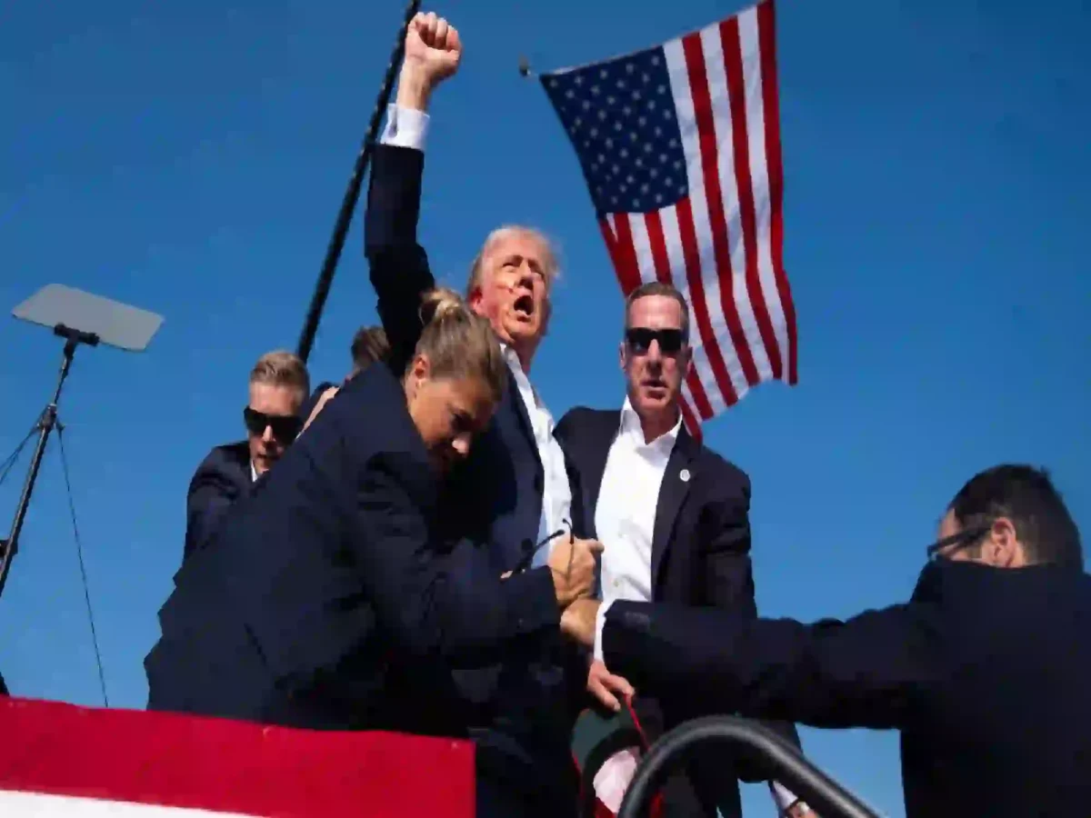 Bloody Faced Donald Trump Raising His Fist After The Assassination Attempt