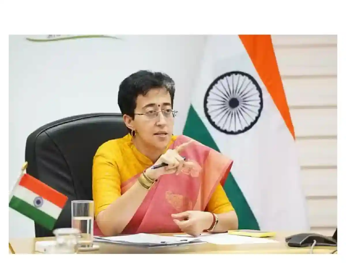 Atishi, Delhi Chief Minister, Surrounded By Paperwork Boxes.