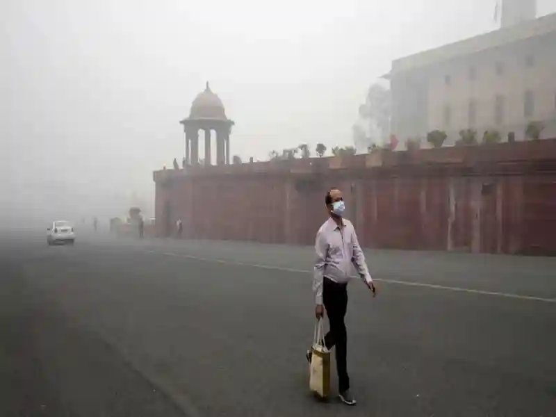 A layer of haze shrouded the city, slightly blurring the silhouettes and hampering visibility, according to the Central Pollution Control Board (CPCB).