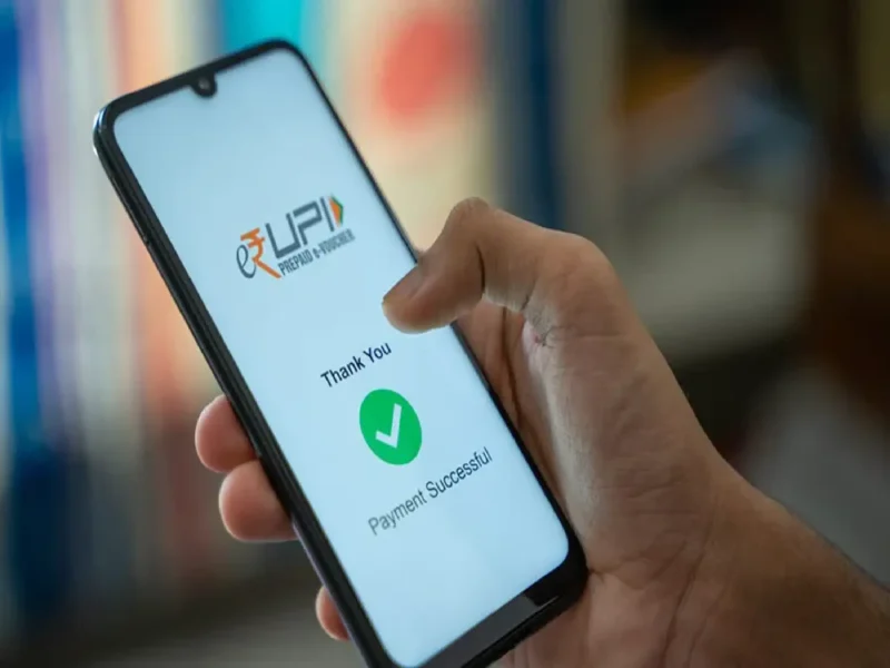 A Man Uses His Phone To Scan A Qr Code Of The Digital Payment App Paytm After Purchasing A Cold Beverage At A Shop In Kolkata, India On July 9, 2024