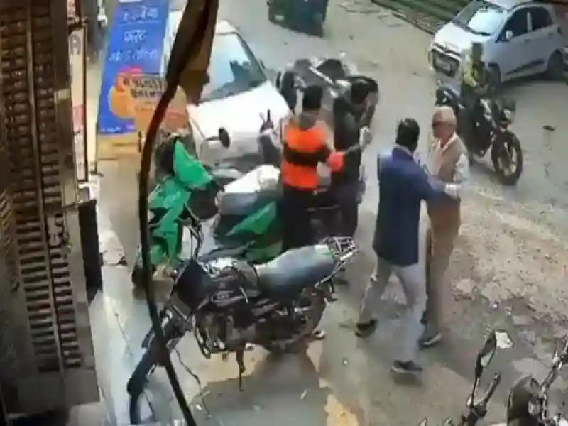 The moment when a Hyundai Santro car rams several people on a road in north Delhi's Adarsh Nagar as seen in CCTV footage.