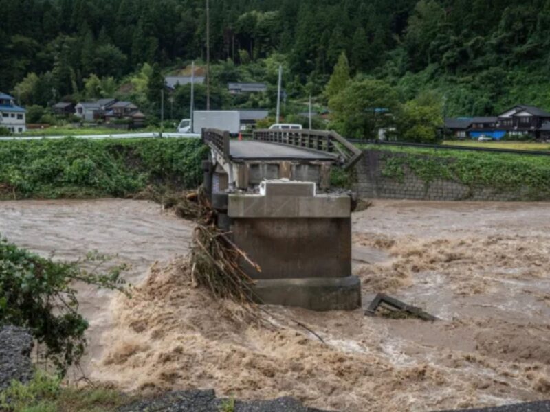 Driftwood Is Caught Under A Bridge, Washed Down A River After Heavy Rains Caused Flooding, In The City Of Wajima, Ishikawa Prefecture, On September 22, 2024.