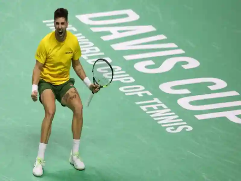 Thanasi Kokkinakis emerged triumphant after a gripping tie-break, saving four match points.