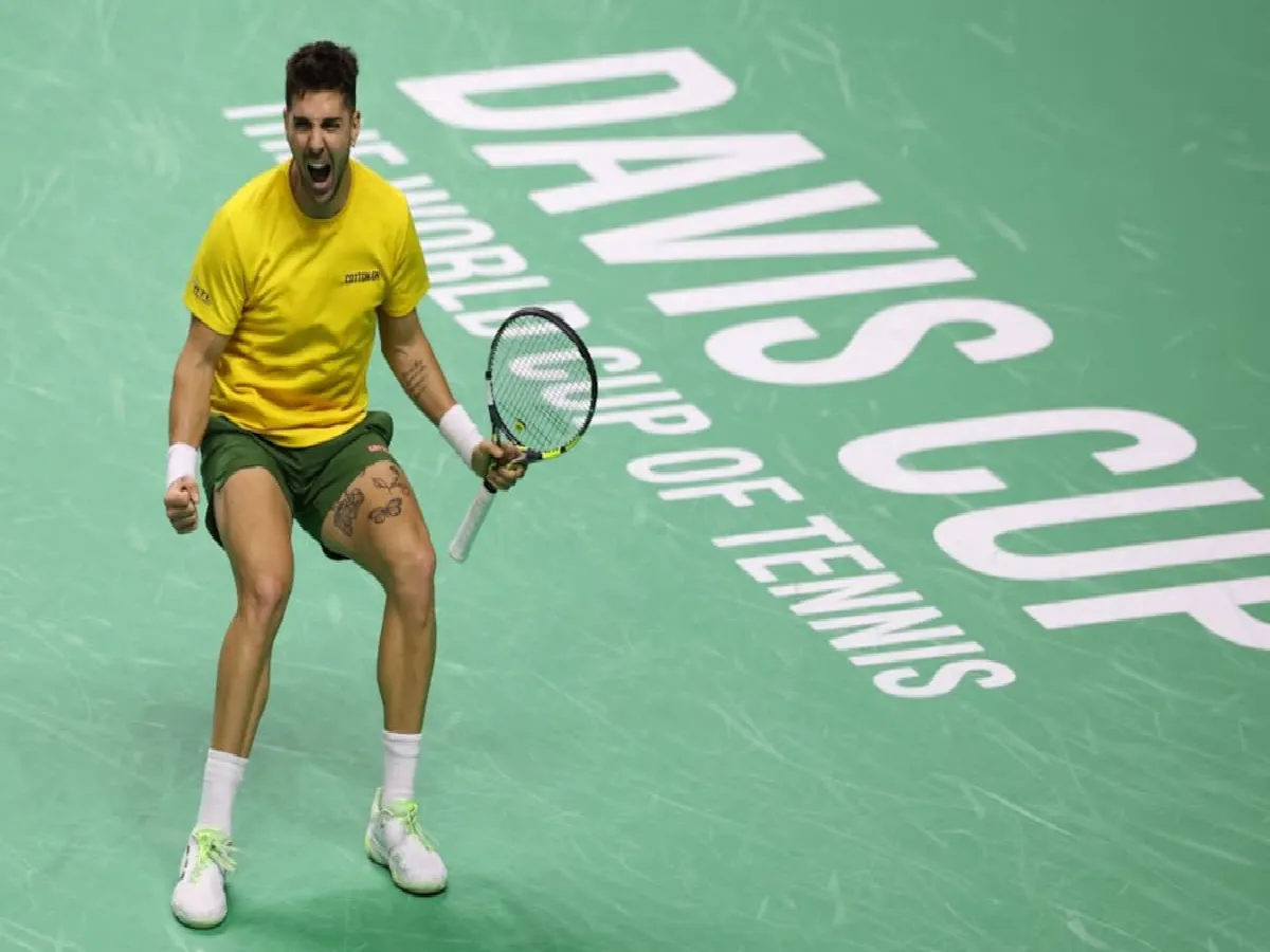 Thanasi Kokkinakis emerged triumphant after a gripping tie-break, saving four match points.