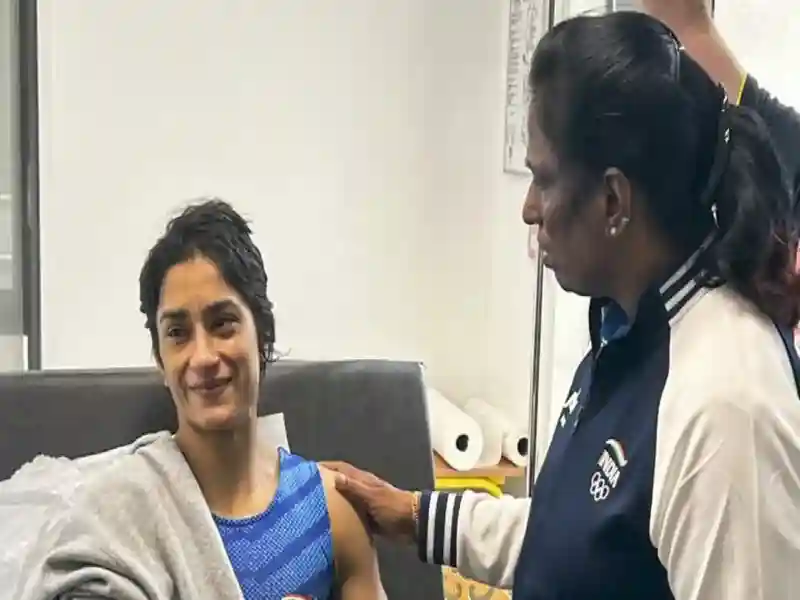 Vinesh Phogat (L) And Pt Usha